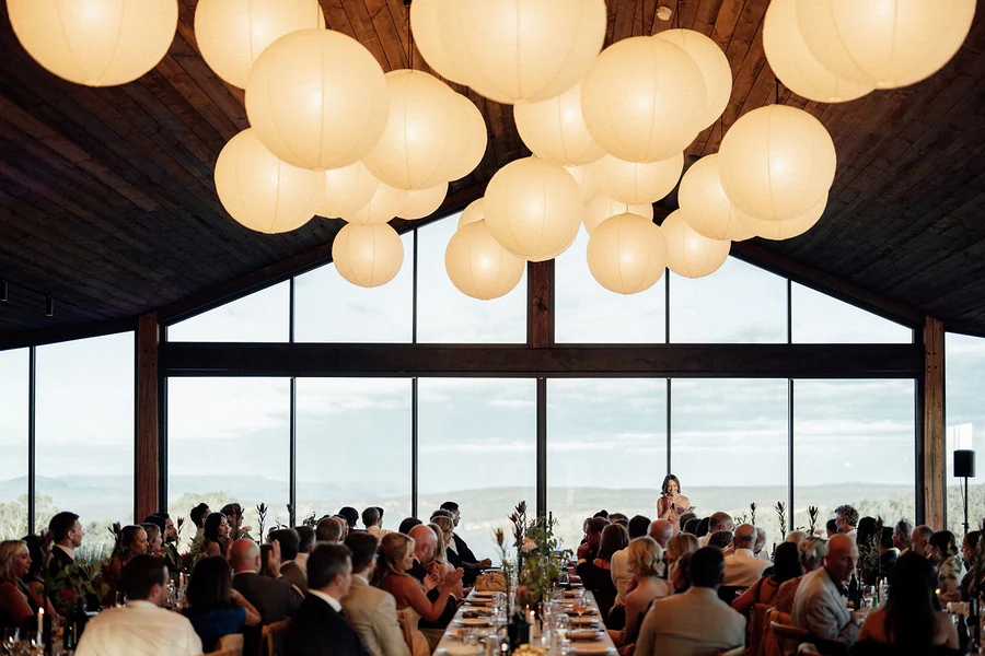 Caoura Cliffs &mdash; guests raising a toast at the reception