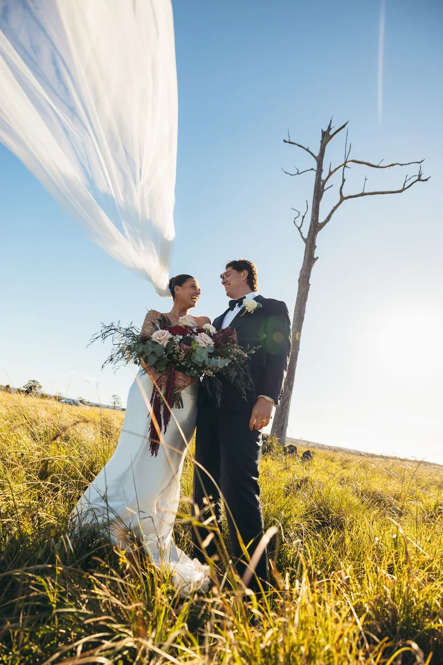 Caoura Cliffs &mdash; a couple in the paddocks at golden hour