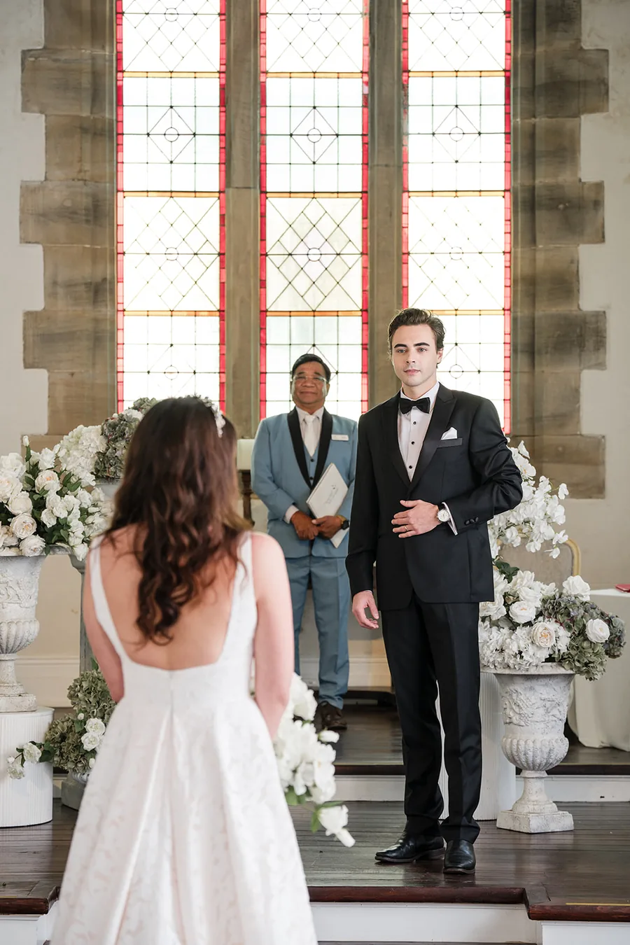 Lords Estate — a ceremony in the chapel beneath the stained glass windows