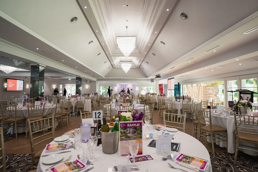 The Grand Ballroom at Oatlands Estate dressed with tall floral centrepieces