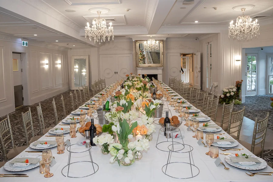 The Rose Suite at Oatlands Estate set as a long table with florals