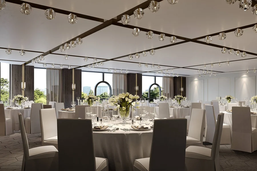 The Hyde Park Room set with round tables overlooking the park