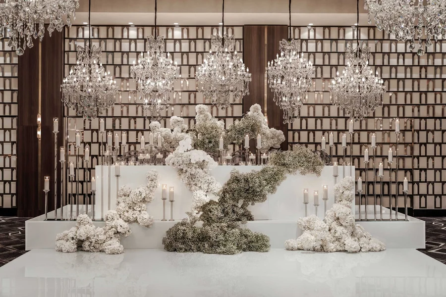 A floral ceremony backdrop styled for a wedding at the hotel