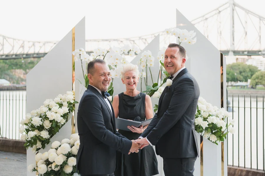 Celebrating In Style &mdash; hanging blooms and candlelight over the reception