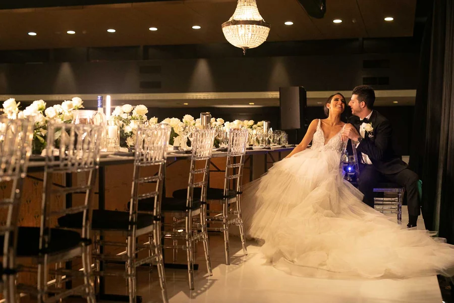 Celebrating In Style &mdash; a banquet table beneath the ballroom chandeliers