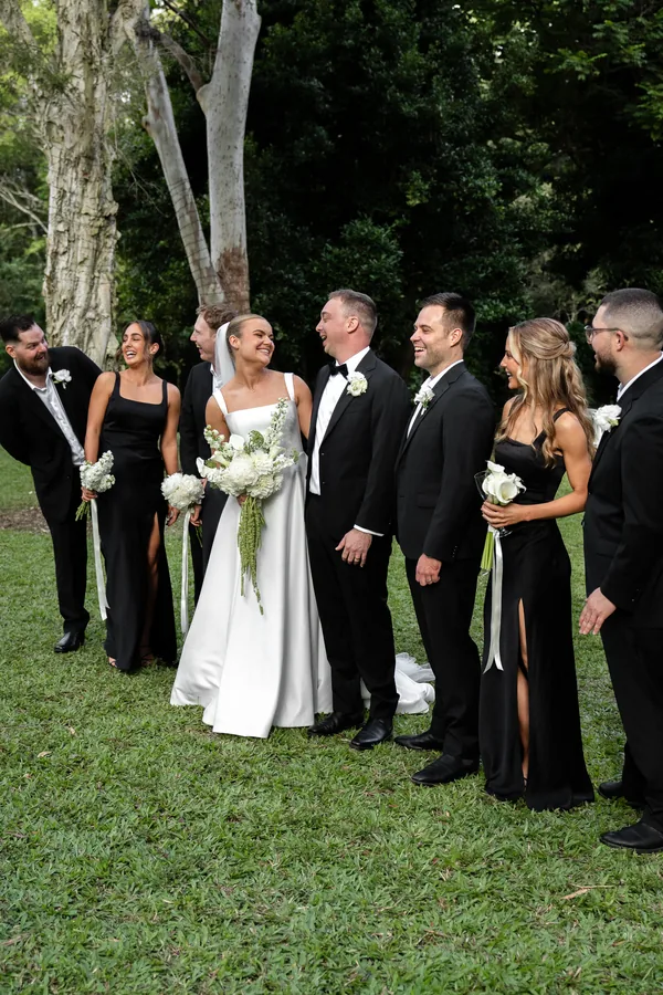 Hitch Perfect — the wedding party outdoors in black tie