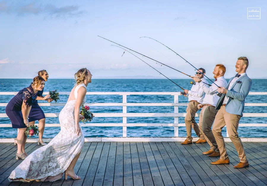 Willidea Studio — a couple at the beach railing