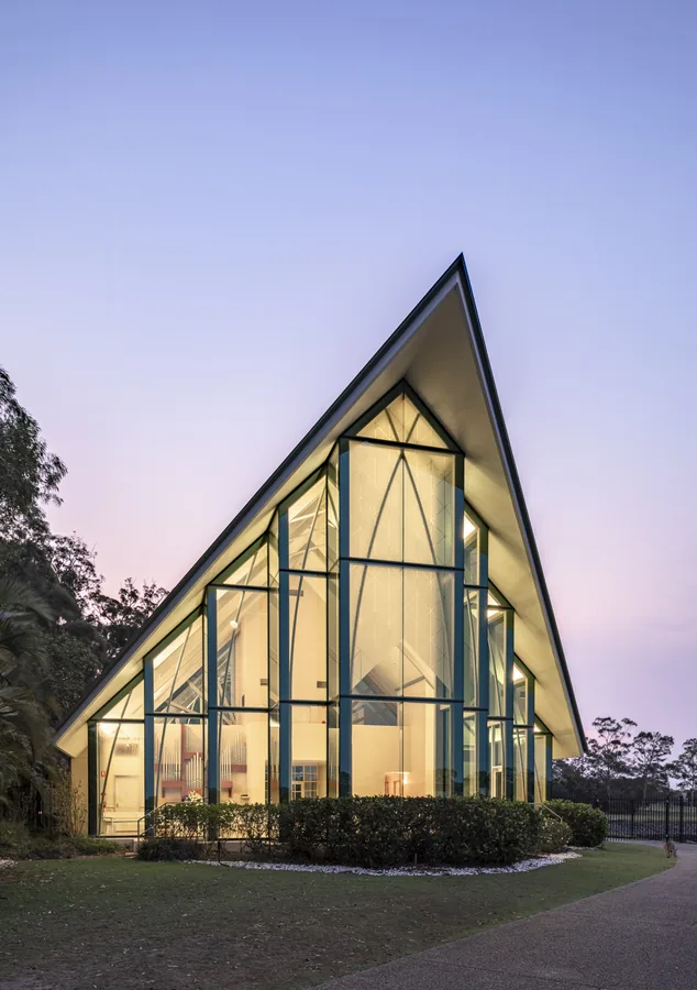InterContinental Sanctuary Cove Resort — the chapel exterior at dusk beside the Coomera River