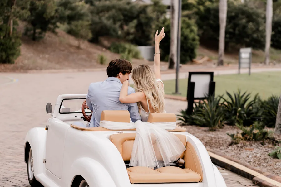InterContinental Sanctuary Cove Resort — a couple in the resort buggy