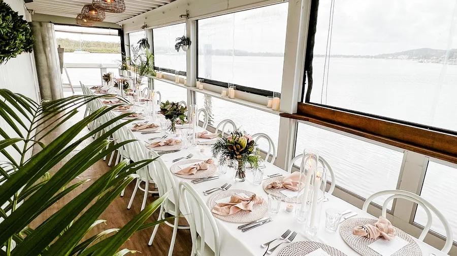 The Eastern Deck at Noosa Boathouse, an intimate open-air dining space on the water