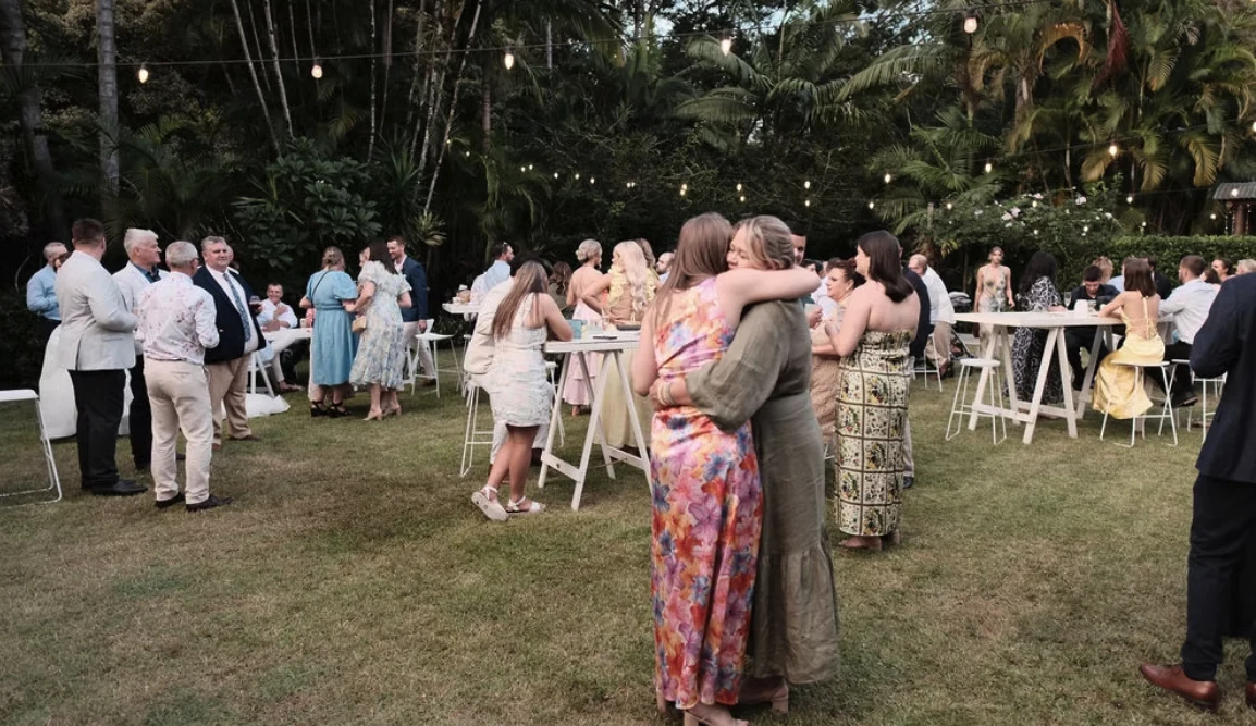 Guests on the garden lawn at Sol Gardens