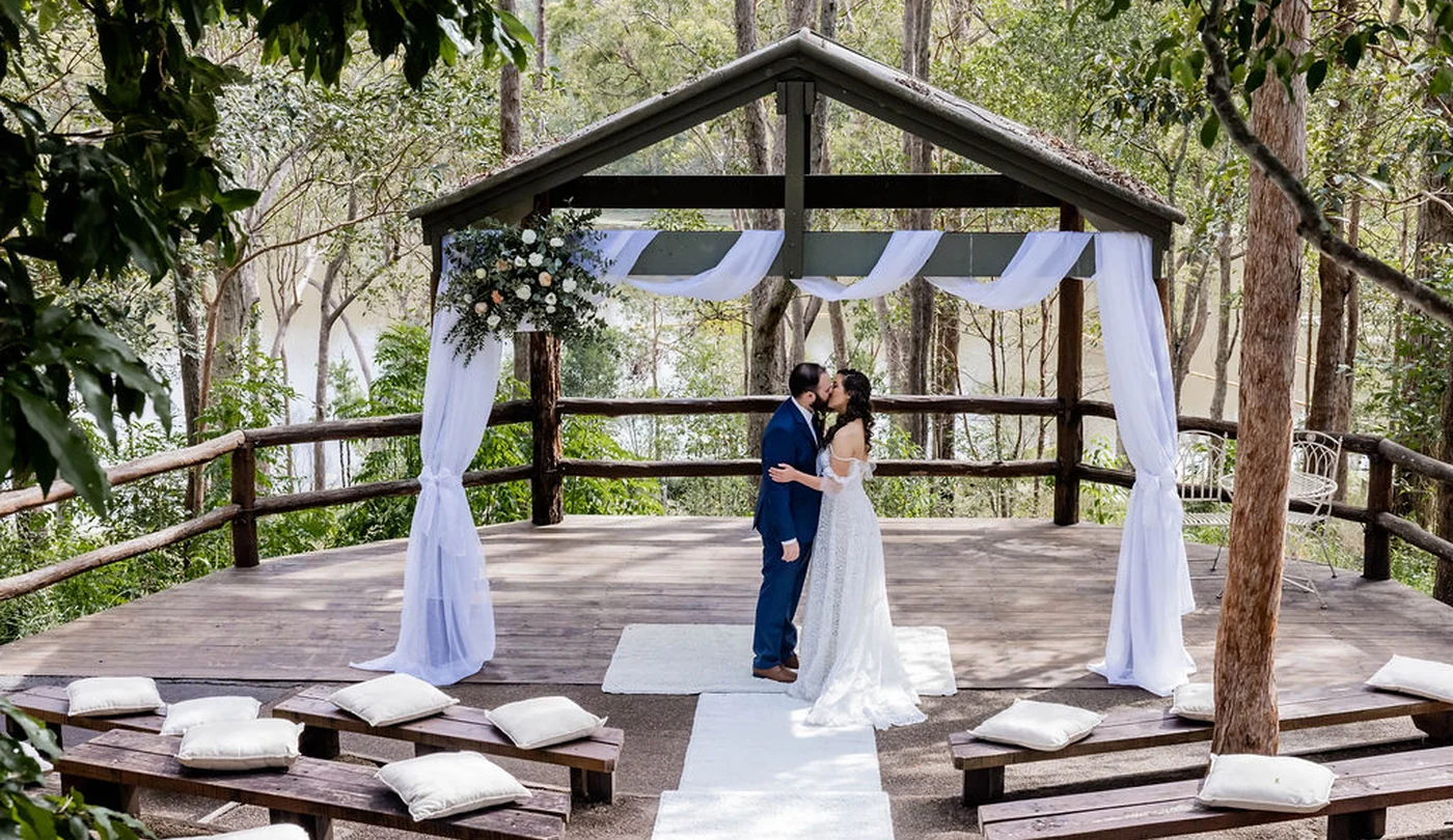 Lakeview ceremony stage with tiered bench seating at Walkabout Creek