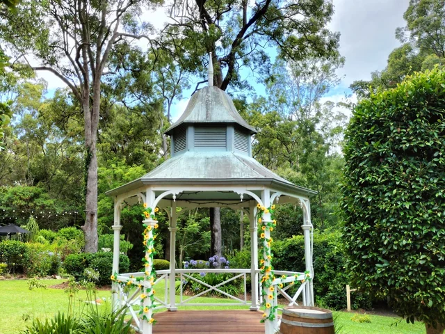Woodford Gardens — the rotunda with a rustic wine barrel signing table