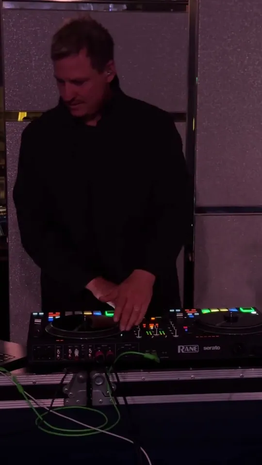 DJ Joe Barrs mixing live on the decks at a wedding