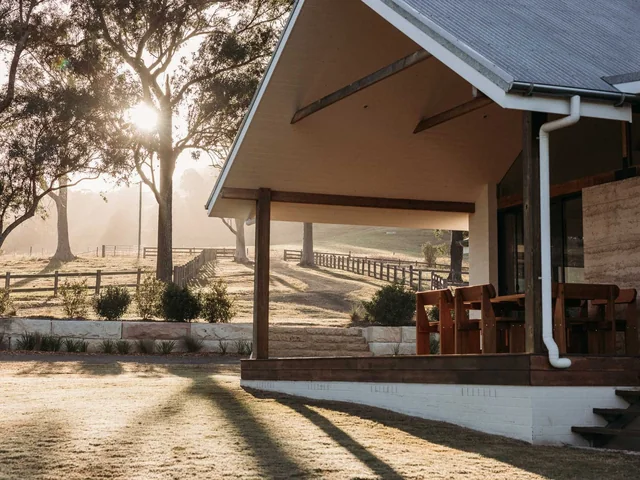 The covered deck of the farmhouse at Wallaringa Farm in morning light