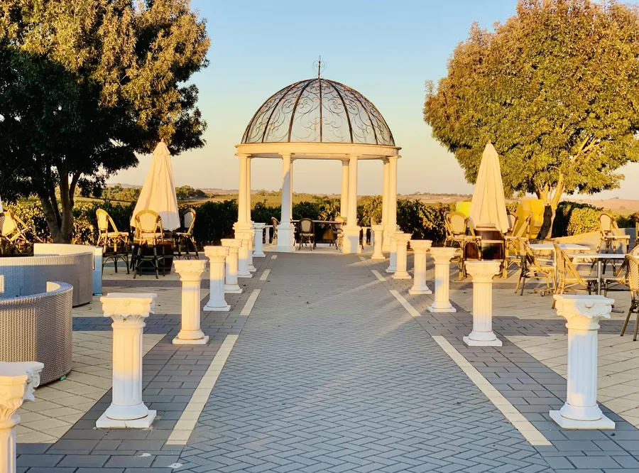 1837 Barossa &mdash; the plaza set with tables under the colonnade