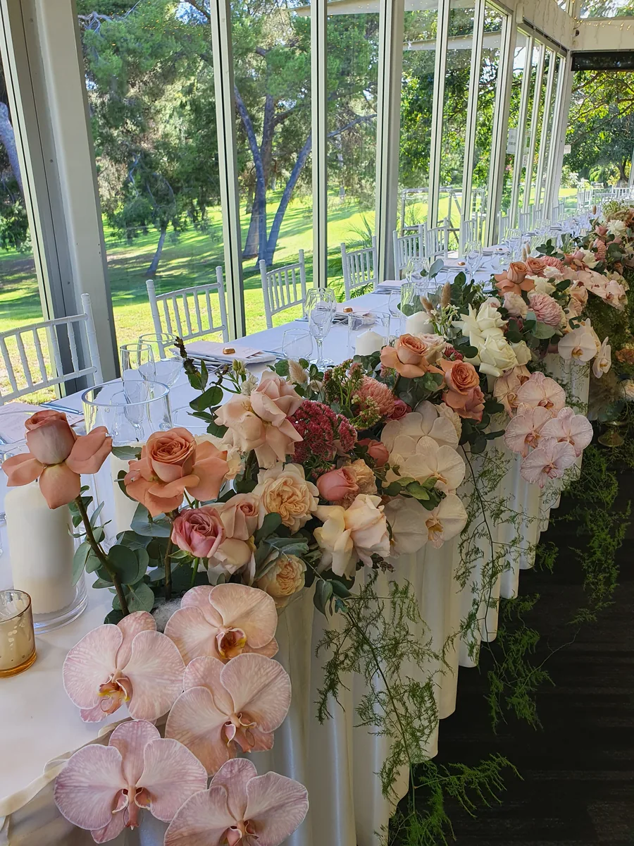 Adelaide Pavilion — florals along the window tables