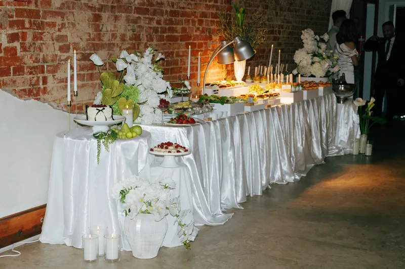 Coco NB &mdash; a long table styled with white florals and grazing