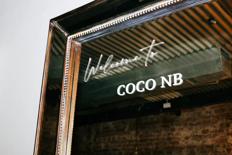 Coco NB &mdash; the Welcome to Coco NB mirror sign