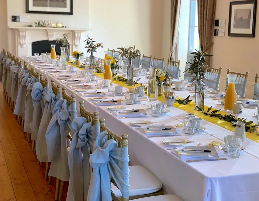 Glanville Hall &mdash; a long table dressed for a reception
