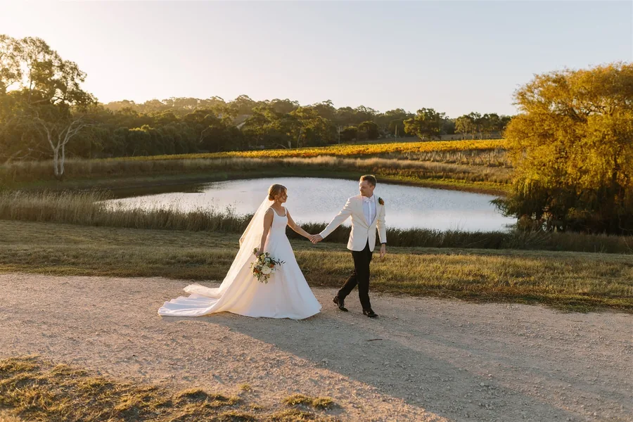 Howard Vineyard — the couple by the dam