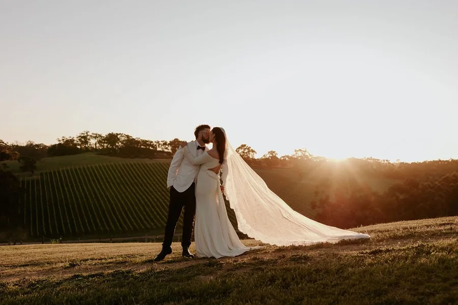 Longview Vineyard &mdash; the couple at sunset above the vines