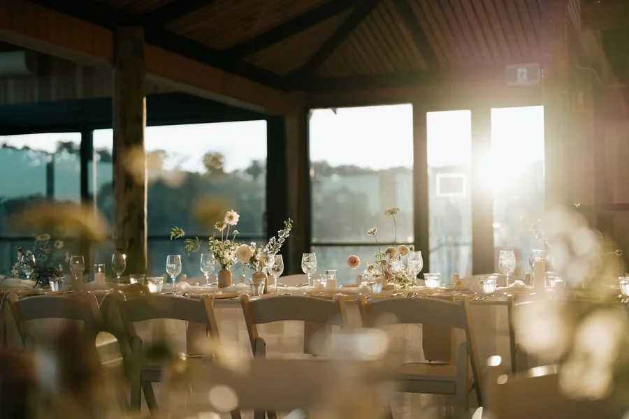 Longview Vineyard &mdash; a reception table in the barn in the afternoon light