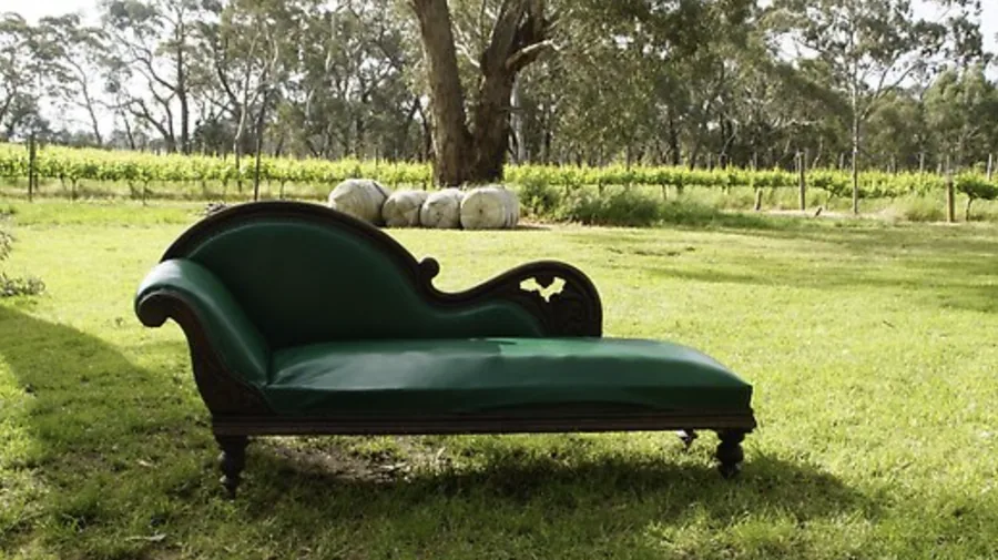 Magpie Springs — a chaise set out among the vines