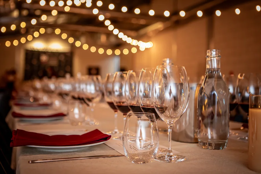 Parker Coonawarra Estate &mdash; long tables under festoon lights in the Stillage