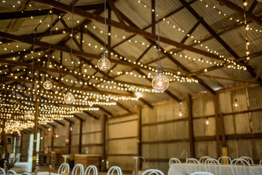 The Brae Dawesley &mdash; the Long Barn lit with festoon lights