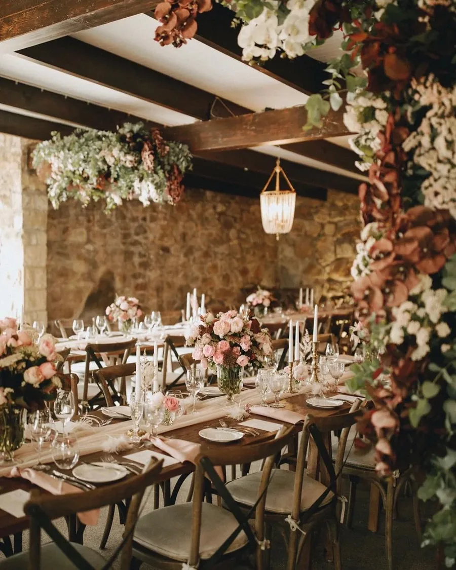 The Manor Basket Range &mdash; a long table under a floral installation
