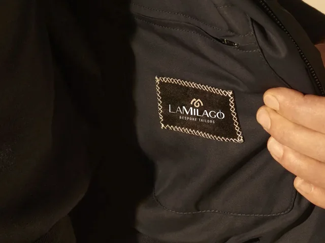The LaMilago label inside a bespoke jacket