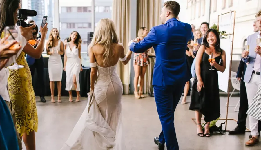 Melbourne Entertainment Company: bridal entrance with guests cheering
