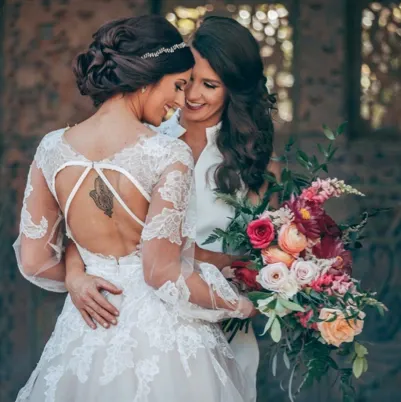 Melbourne Entertainment Company: two brides with their bouquet