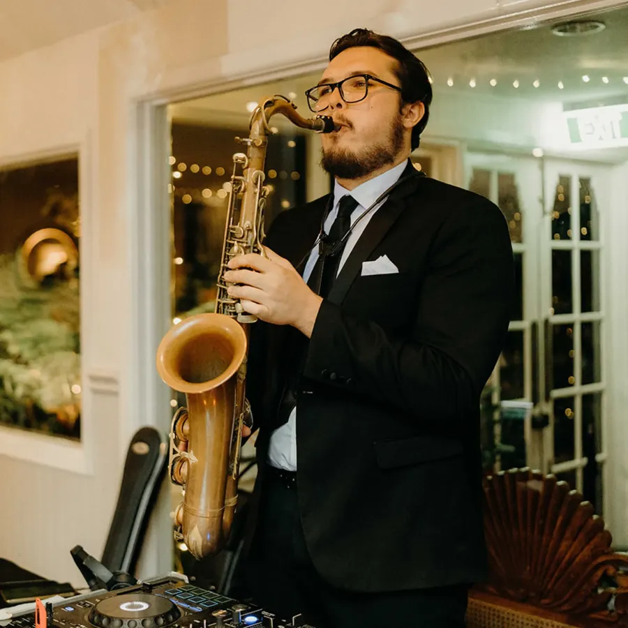 Melbourne Entertainment Company: saxophonist playing at a reception