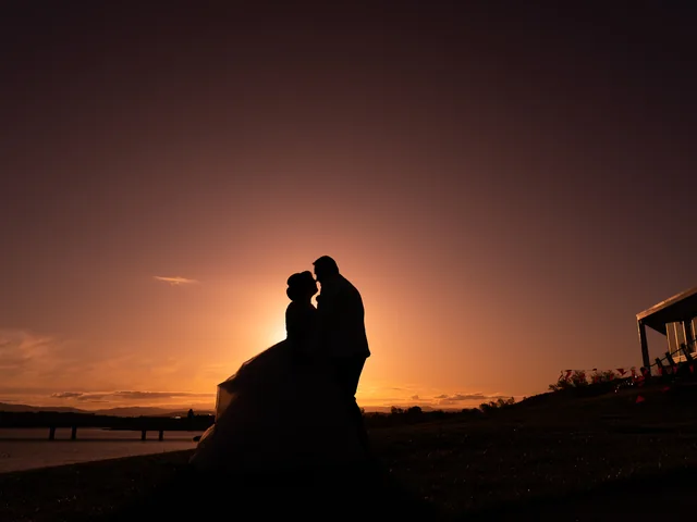 A Shot Above The Rest Photography: Couple silhouetted against a sunset sky