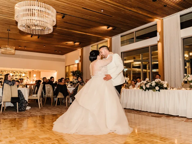 A Shot Above The Rest Photography: First dance under a chandelier in the reception room