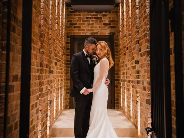 ATEIA Photography & Video: Couple in a lit brick corridor