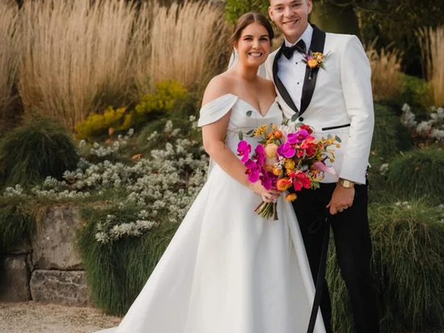 ATEIA Photography & Video: Bride and groom with her bright bouquet in a native garden