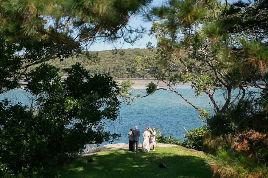 A Celebration Day: a waterside ceremony beneath the trees