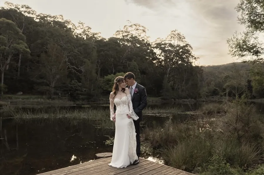 A Celebration Day: couple on a jetty at golden hour