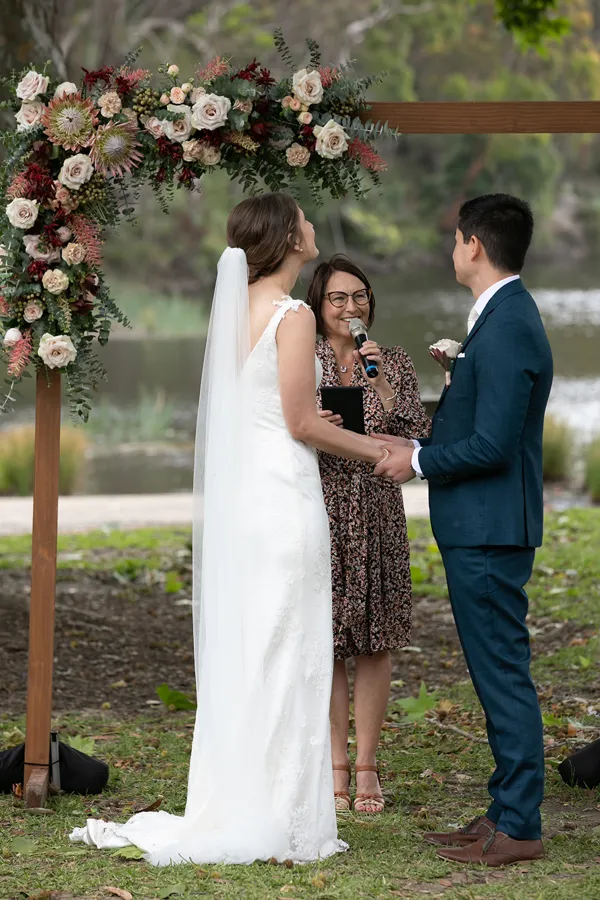 A Celebration Day: exchanging vows beneath a floral arbour