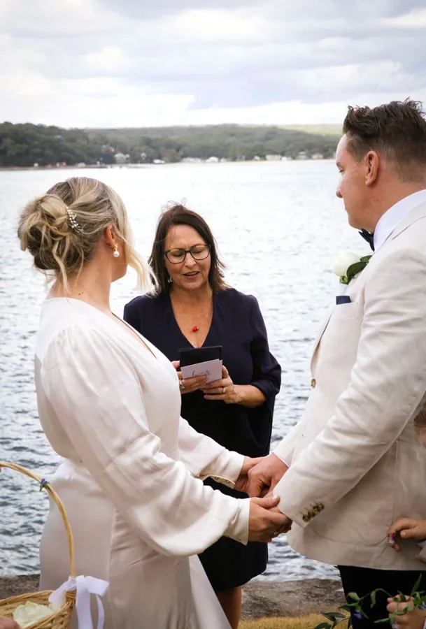 A Celebration Day: Amanda leading a ceremony by the water