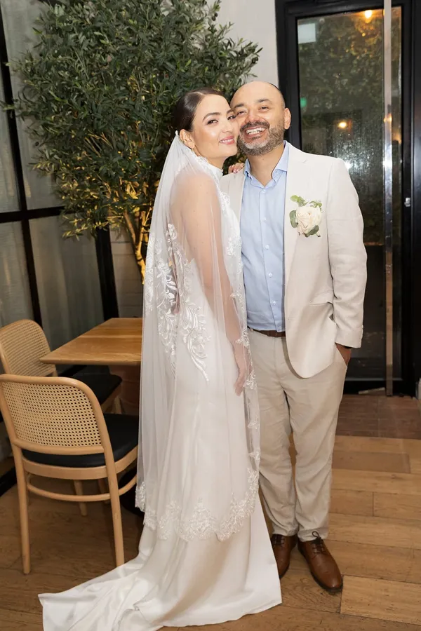A Celebration Day: newlyweds in a cafe after an intimate ceremony