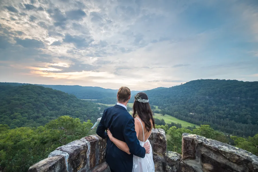 Jazzy Photography: couple taking in the valley view from a stone lookout at Wisemans Ferry