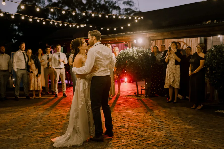 Meredith Photography: first dance under festoon lights