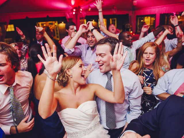 Sydney DJ & MC Services: Bride, groom and guests dancing on a packed dance floor